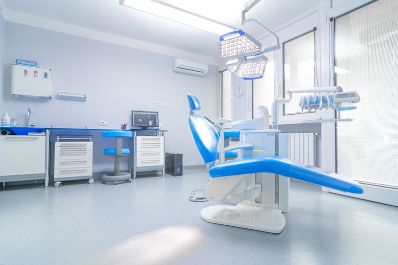 Professional dental treatment room in an orderly clinical setting